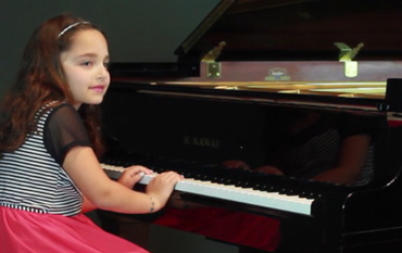 Piano Student Plays Minuet in G